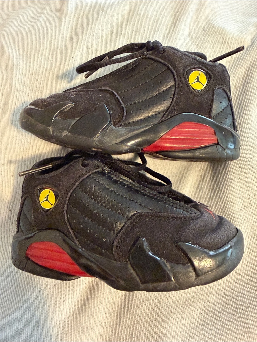 Jordan Kids Black Sneakers with Red and Yellow Accents